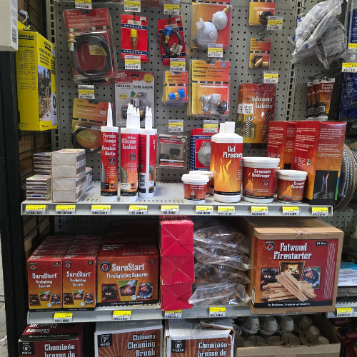 Fire and fuel supplies on display inside of Clintonville Hardware and Rental.