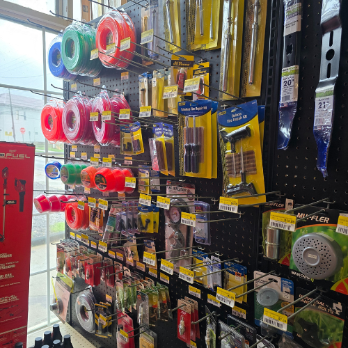 Outdoor tools and supplies on display inside of Clintonville Hardware and Rental.