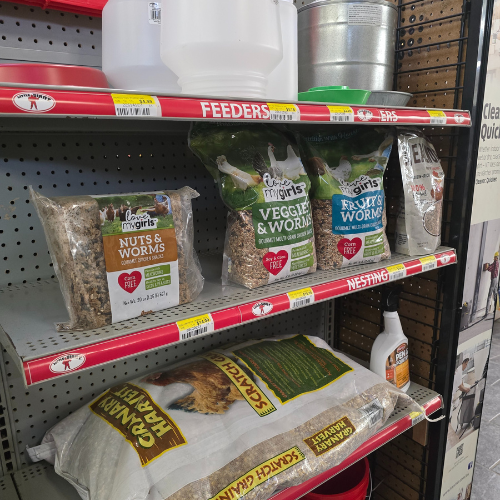 Feed and supplies on display inside of Clintonville Hardware and Rental.